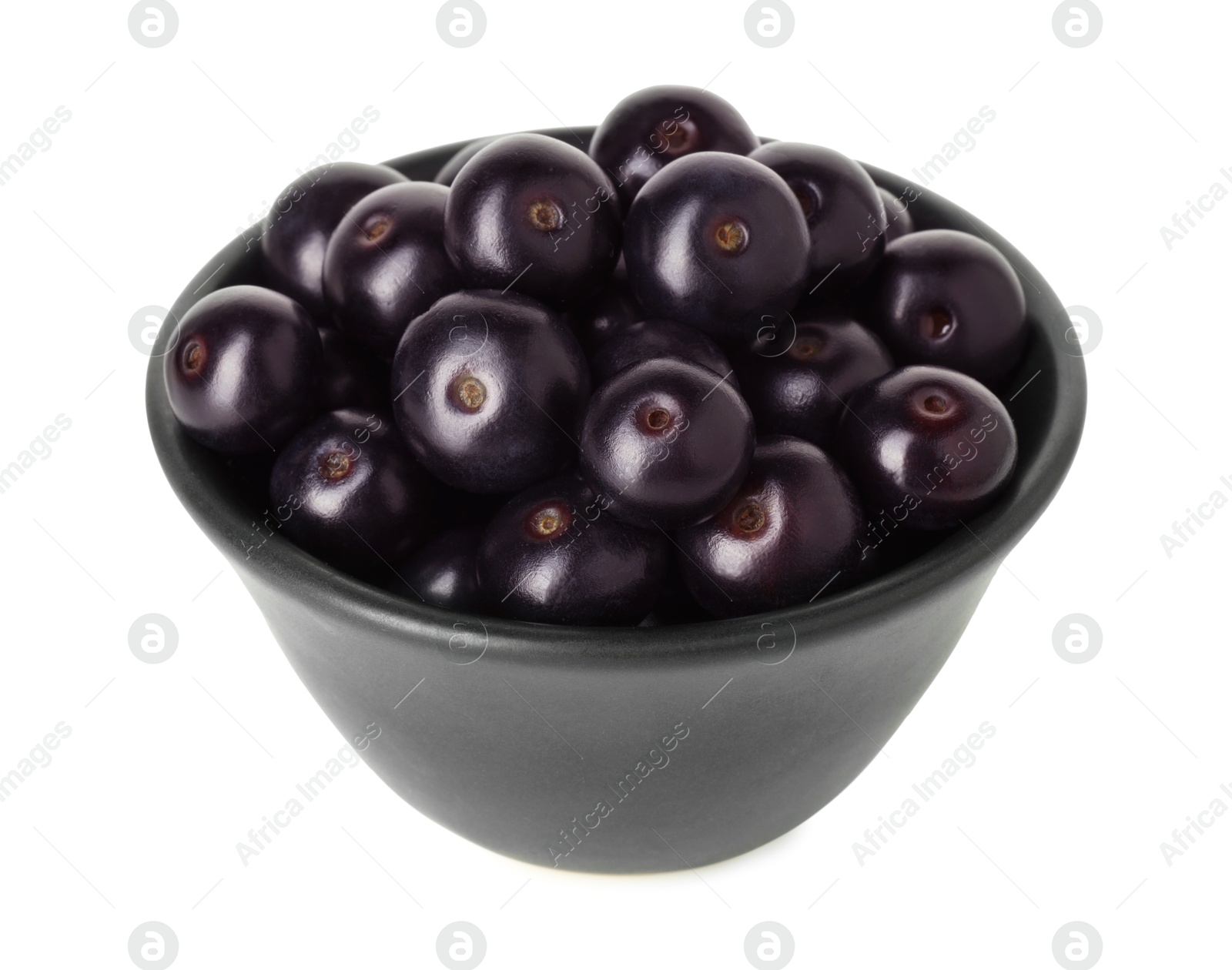 Photo of Fresh ripe acai berries in bowl isolated on white