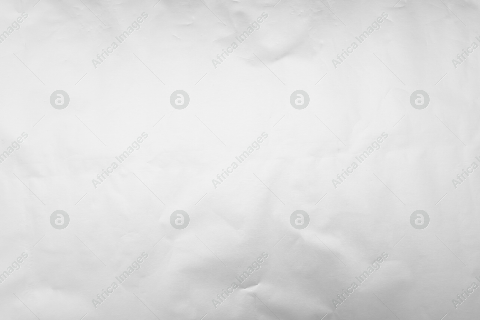 Photo of Shiny silver foil as background, top view