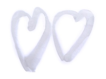 Photo of Hearts drawn by grey spray paint isolated on white, top view