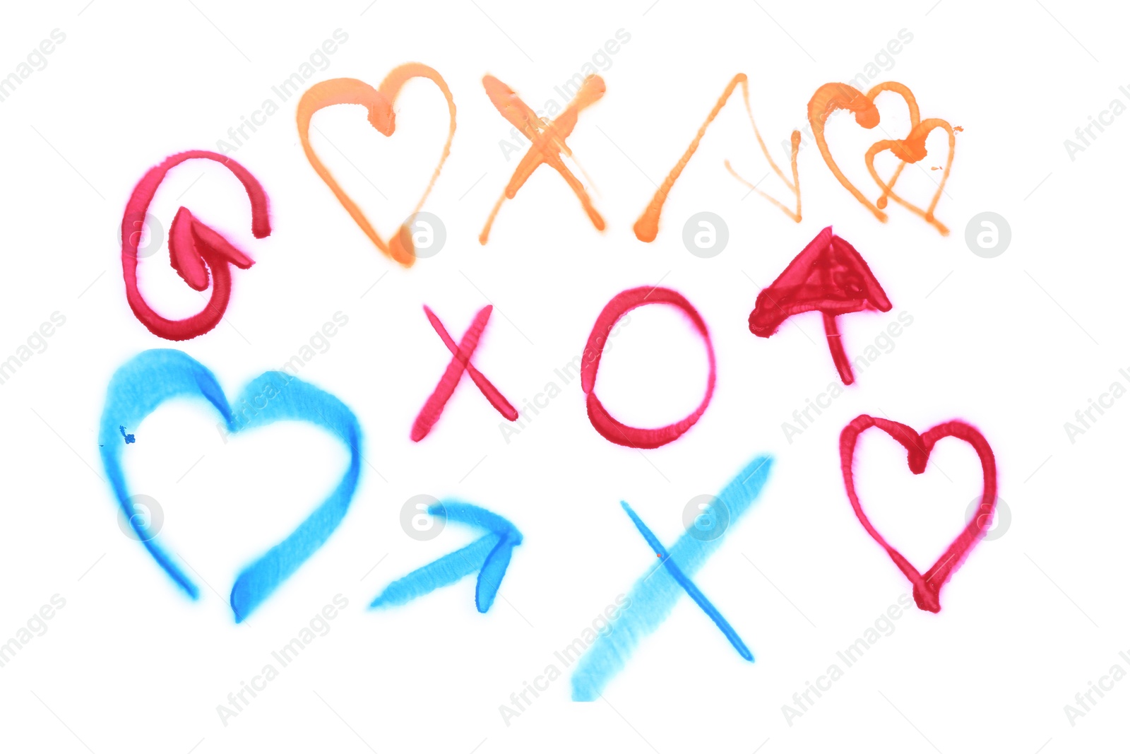 Photo of Different symbols drawn by bright spray paints isolated on white, top view