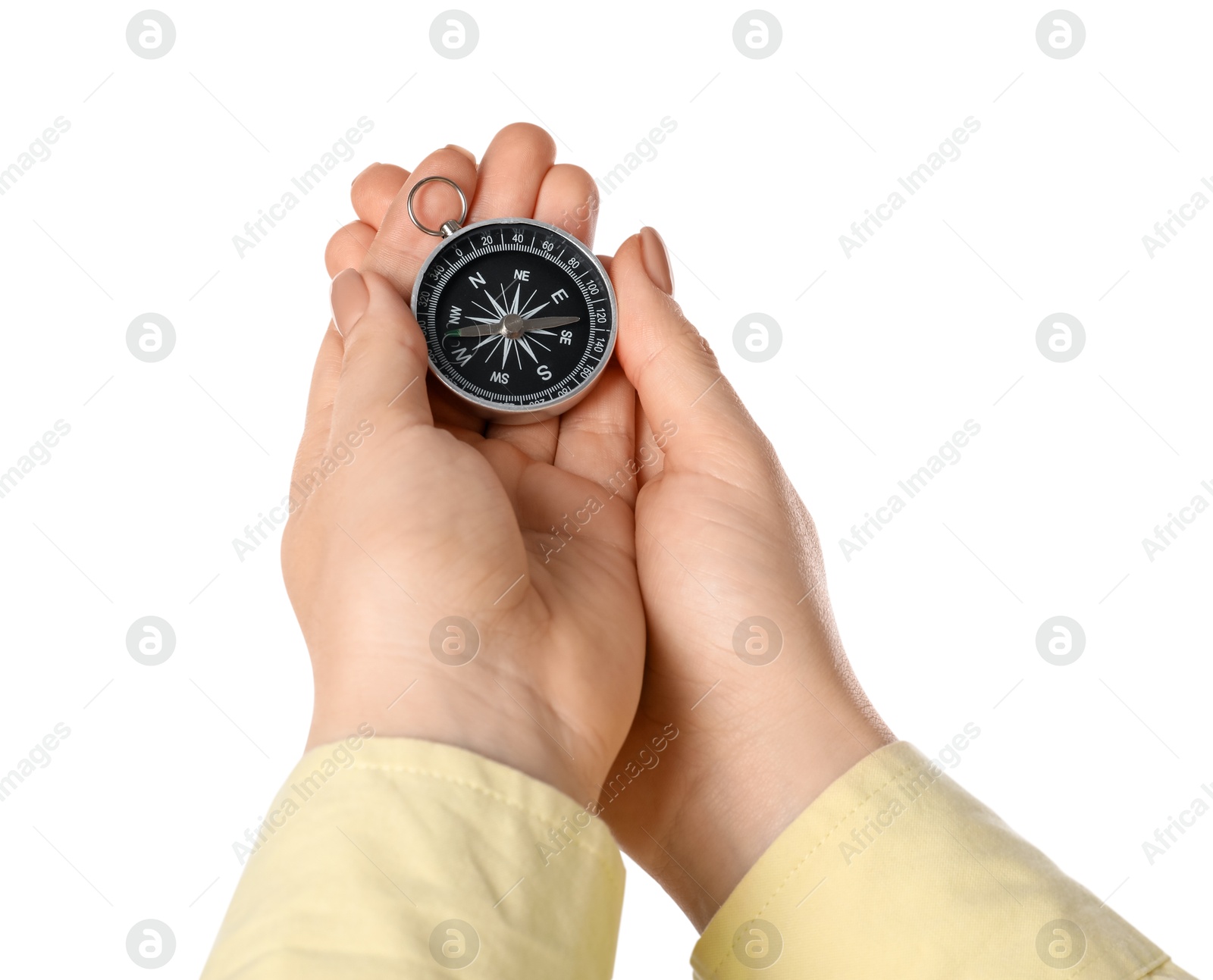 Photo of Woman holding compass on white background, closeup