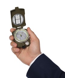 Man holding compass on white background, closeup