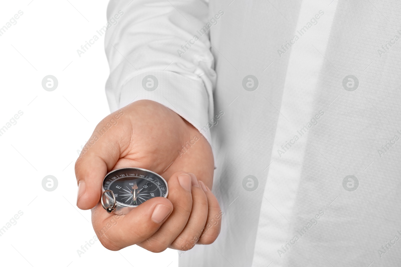 Photo of Man holding compass on white background, closeup