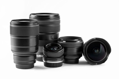 Photo of Camera lens on white background. Photographer's equipment