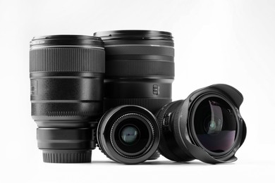 Photo of Camera lens on white background. Photographer's equipment