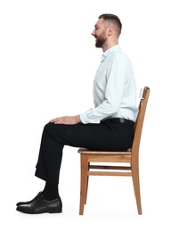 Photo of Man with good posture sitting on chair against white background