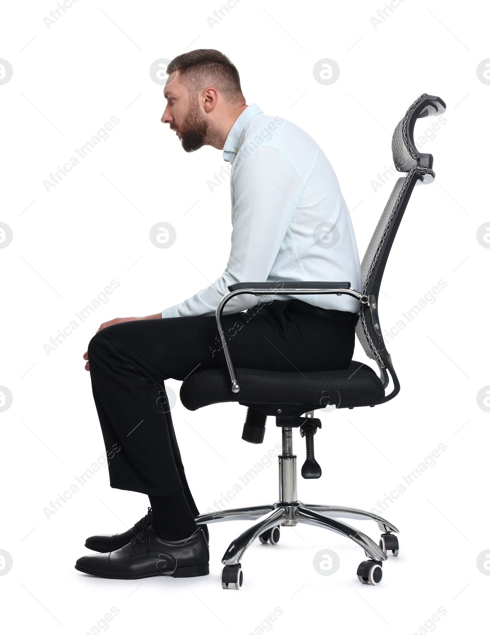 Photo of Man with poor posture sitting on chair against white background