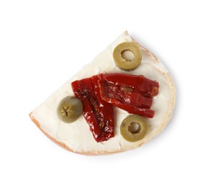 Delicious bruschetta with ricotta cheese, sun dried tomato and olives isolated on white, top view