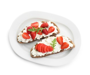 Photo of Delicious ricotta bruschettas with strawberry and arugula isolated on white, top view