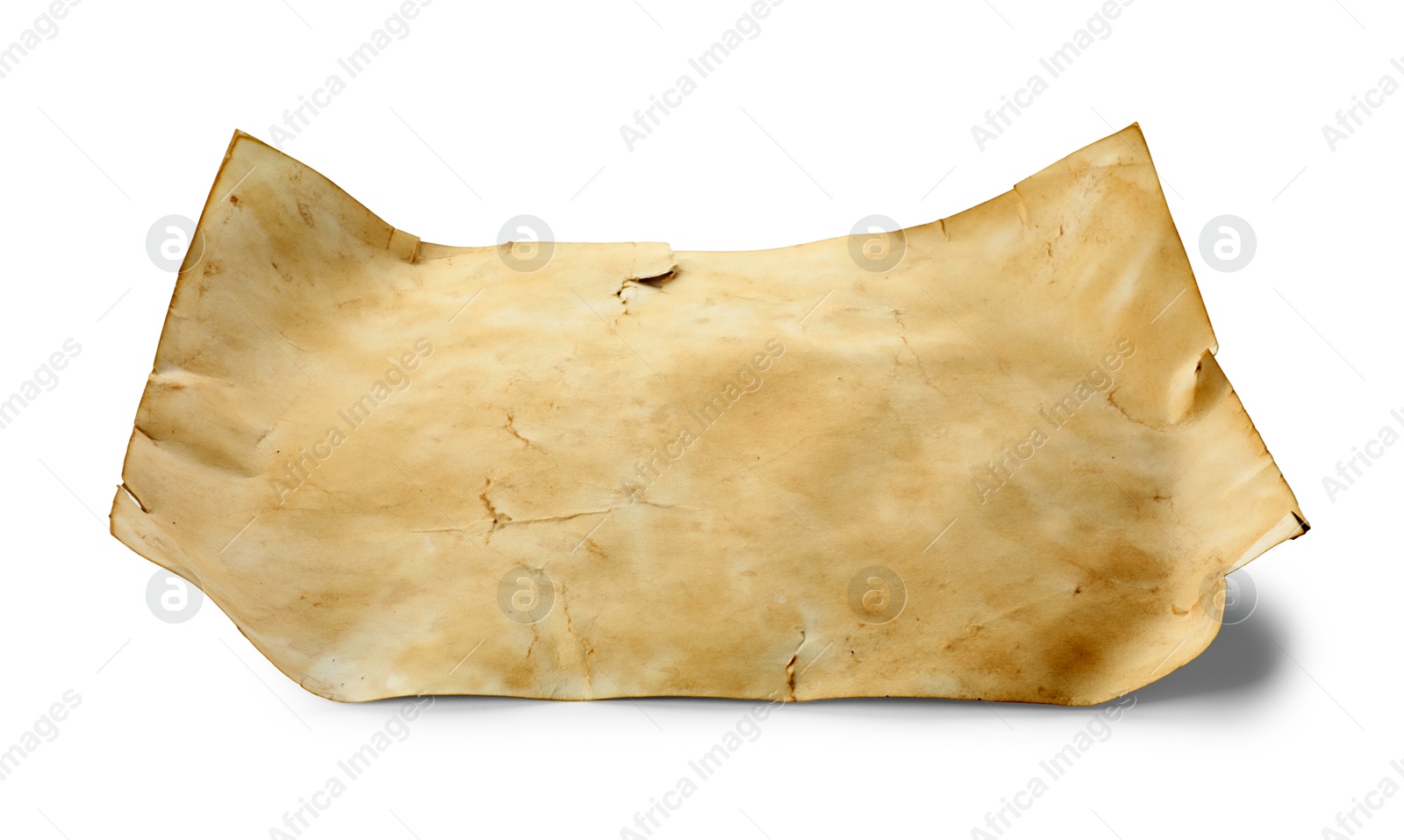 Photo of Sheet of old parchment paper isolated on white