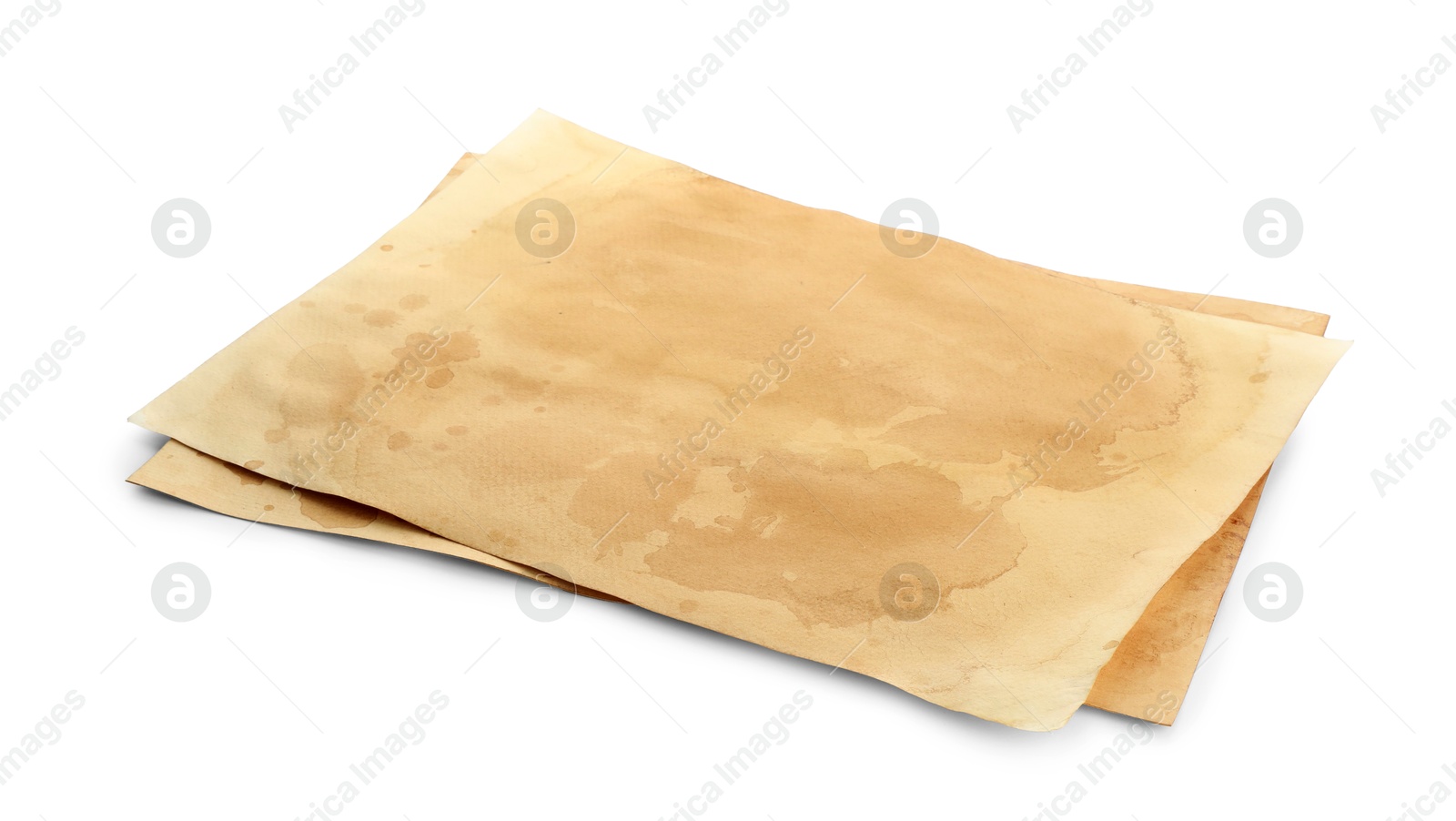 Photo of Sheets of old parchment paper isolated on white