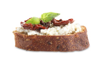 Photo of Delicious ricotta bruschetta with sun dried tomatoes and basil isolated on white