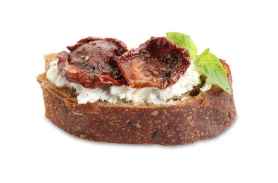 Photo of Delicious ricotta bruschetta with sun dried tomatoes and basil isolated on white