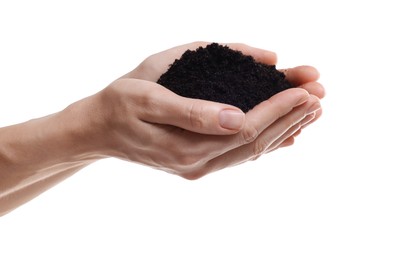 Woman holding pile of soil on white background, closeup