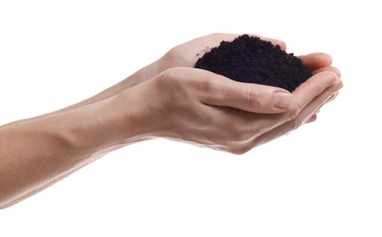 Woman holding pile of soil on white background, closeup