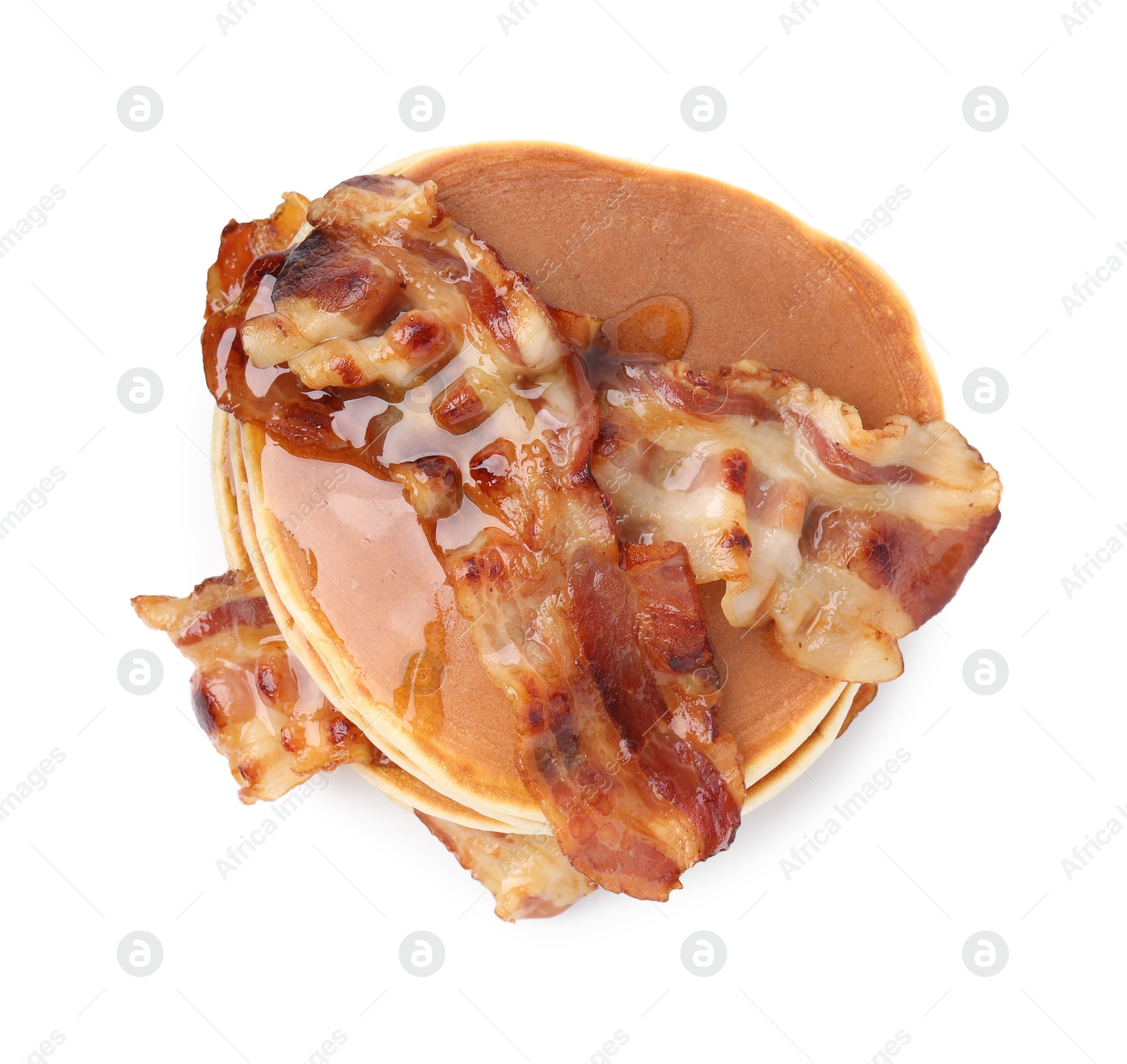 Photo of Delicious pancakes with fried bacon isolated on white, top view