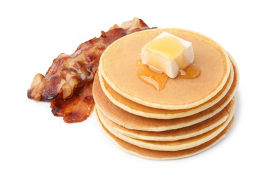 Photo of Delicious pancakes with butter and fried bacon isolated on white