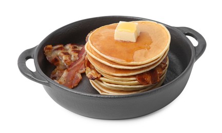 Photo of Tasty pancakes with butter and fried bacon isolated on white