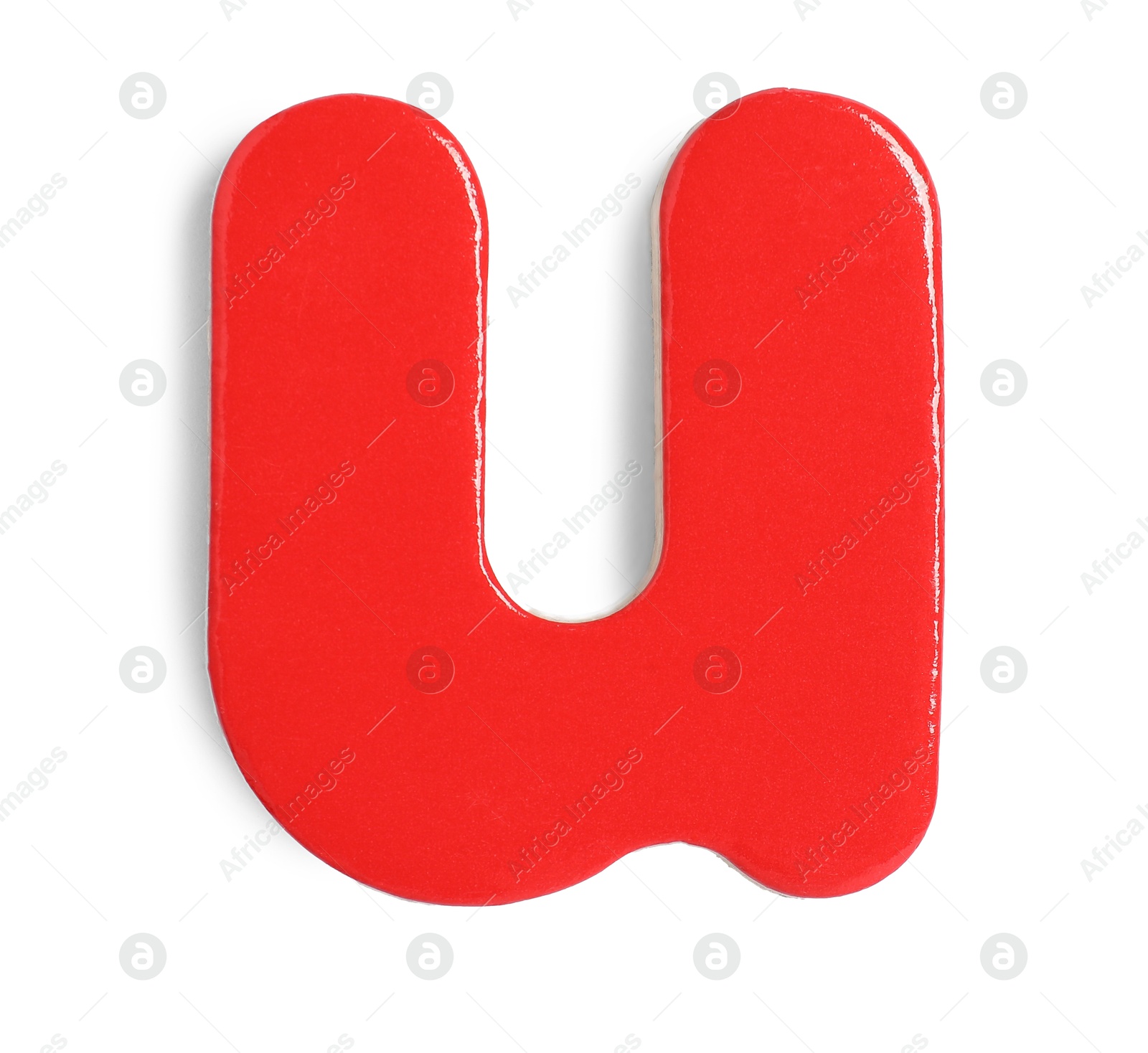 Photo of Red magnetic letter U isolated on white, top view. Alphabet
