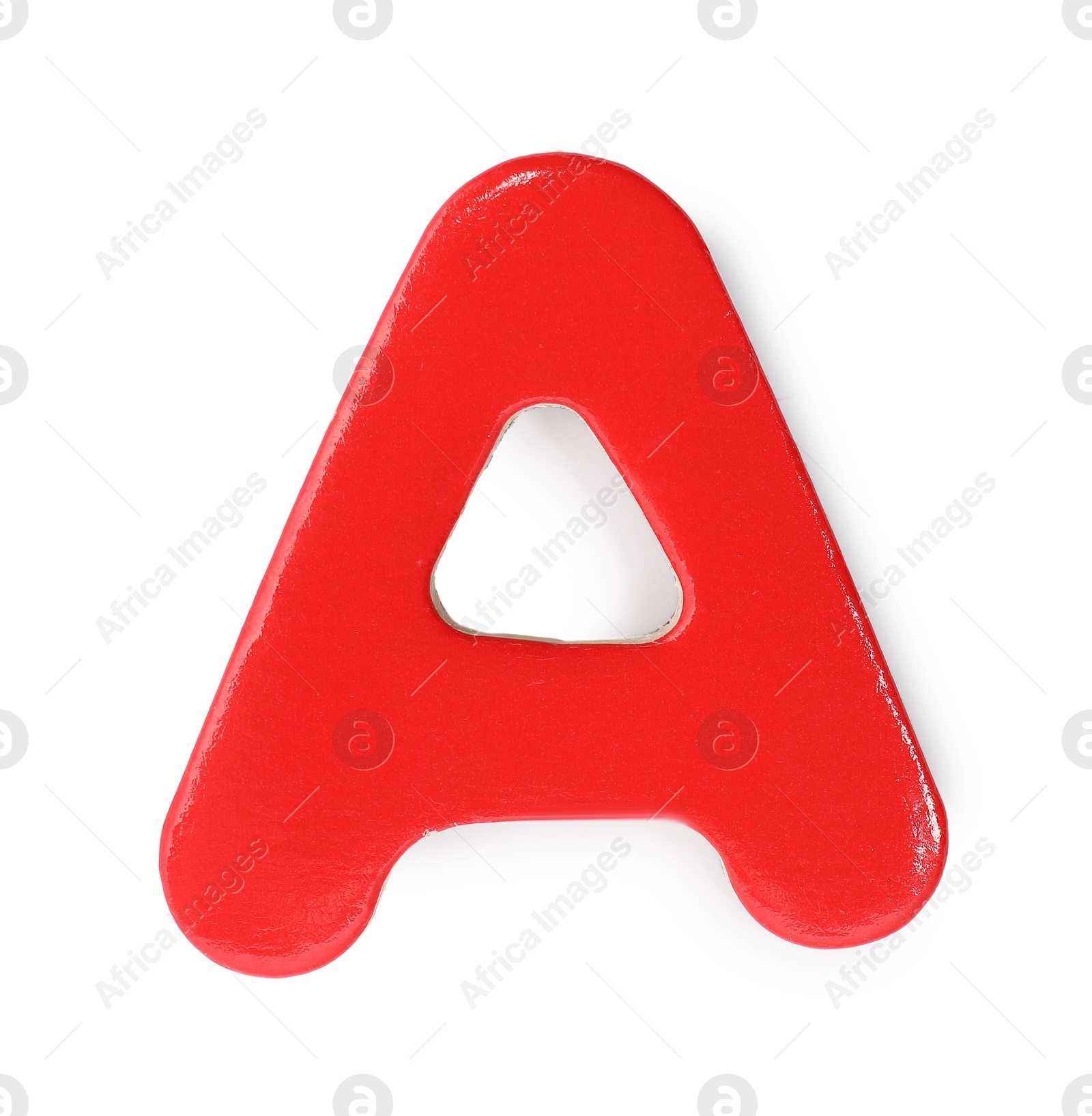 Photo of Red magnetic letter A isolated on white, top view. Alphabet