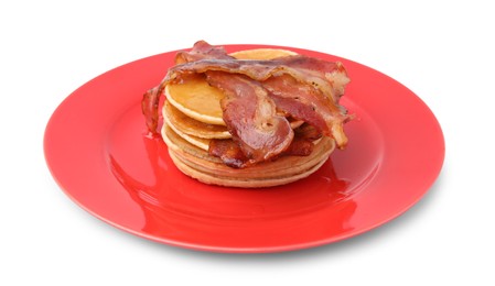 Delicious pancakes with bacon isolated on white