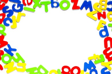 Alphabet. Many colorful magnetic letters isolated on white, top view