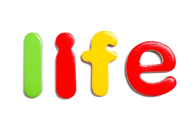 Alphabet. Word Life of magnetic letters isolated on white, top view