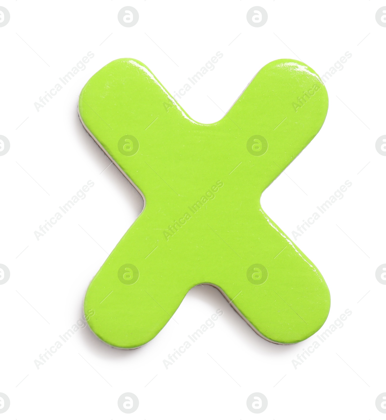 Photo of Alphabet. Green magnetic letter X isolated on white, top view