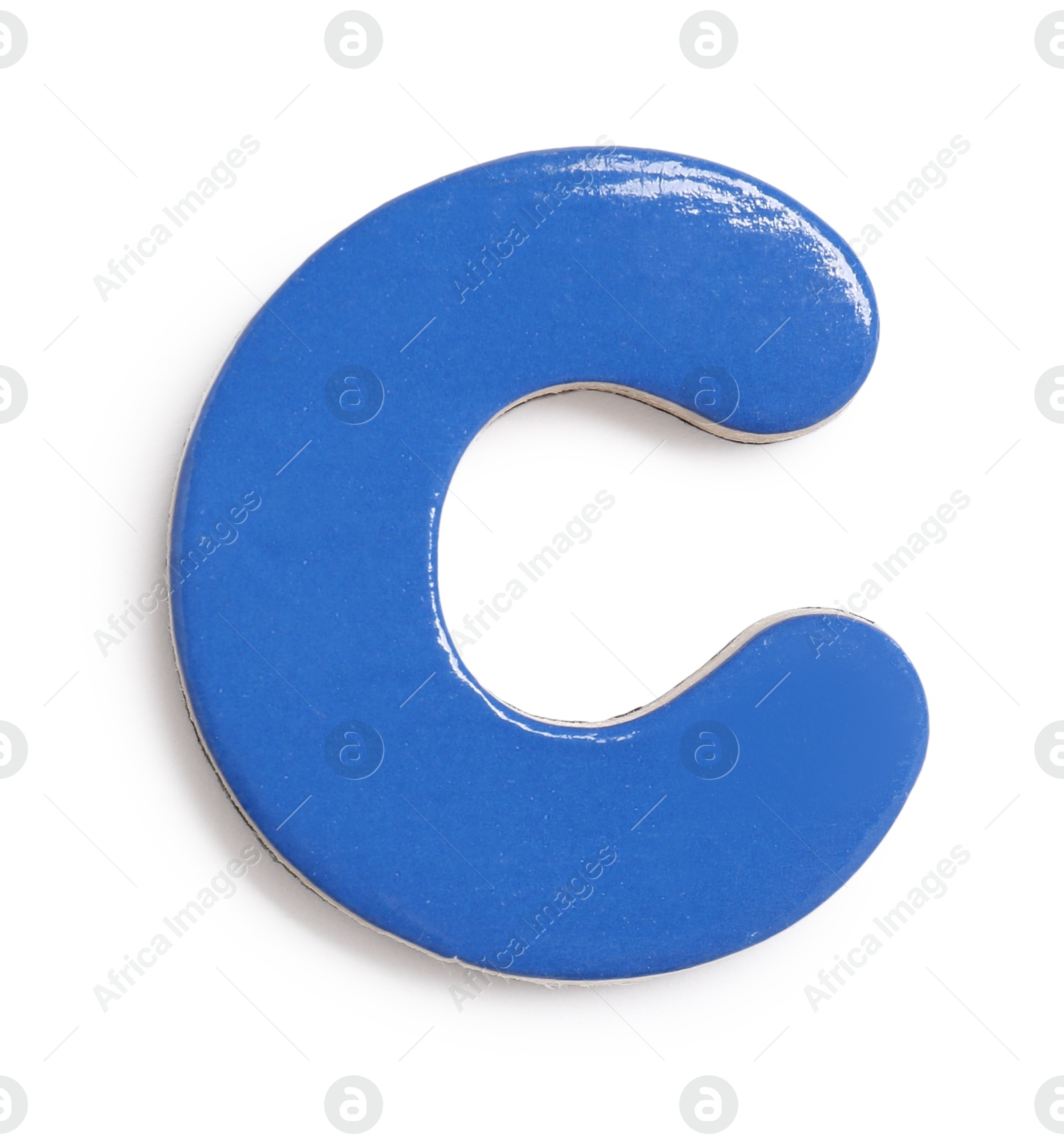 Photo of Alphabet. Blue magnetic letter C isolated on white, top view