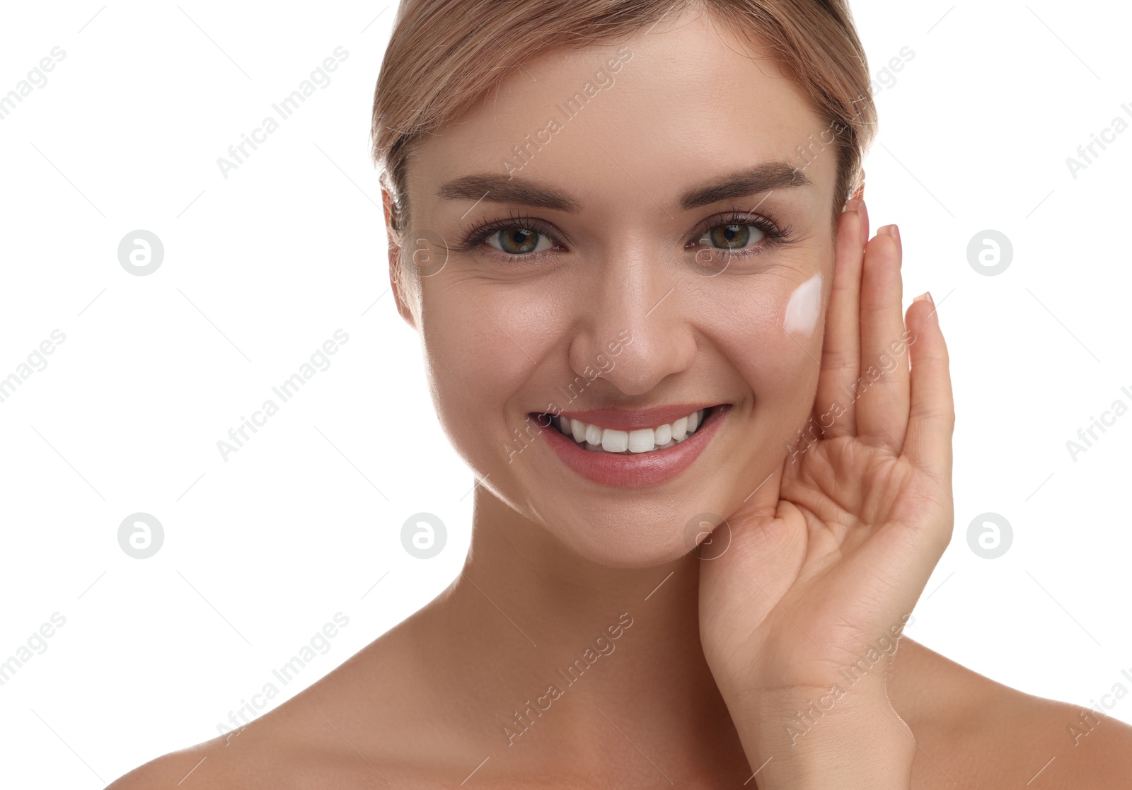 Photo of Beautiful woman with cream on her face against white background, closeup