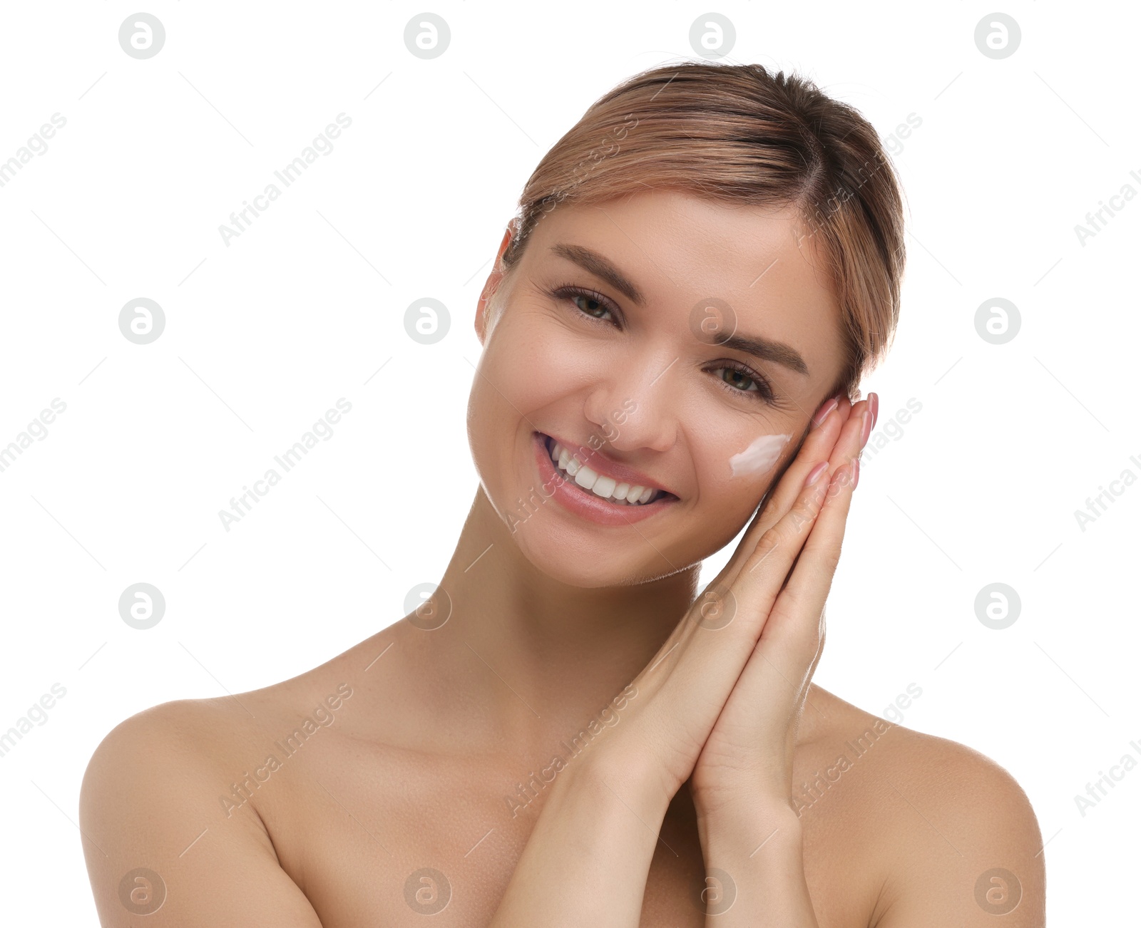 Photo of Beautiful woman with cream on her face against white background