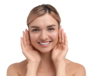 Photo of Beautiful woman with cream on her face against white background