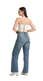Woman in stylish corset on white background, back view