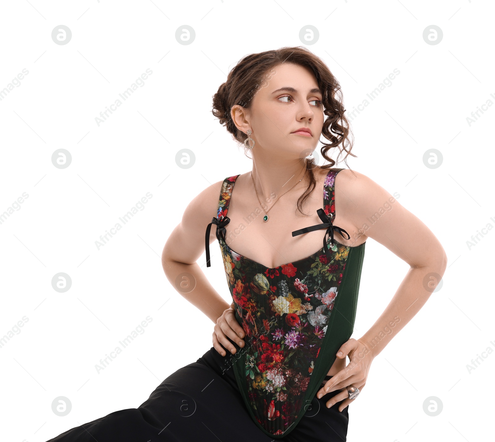 Photo of Beautiful woman in stylish corset posing on white background