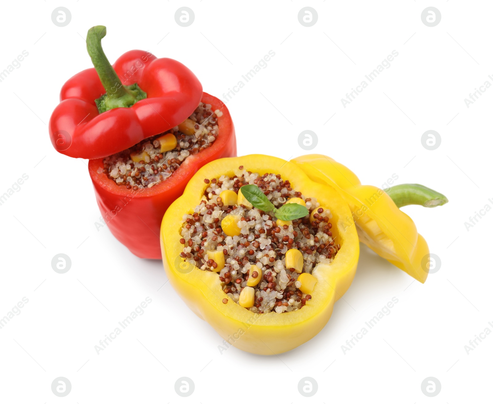 Photo of Quinoa stuffed bell peppers isolated on white