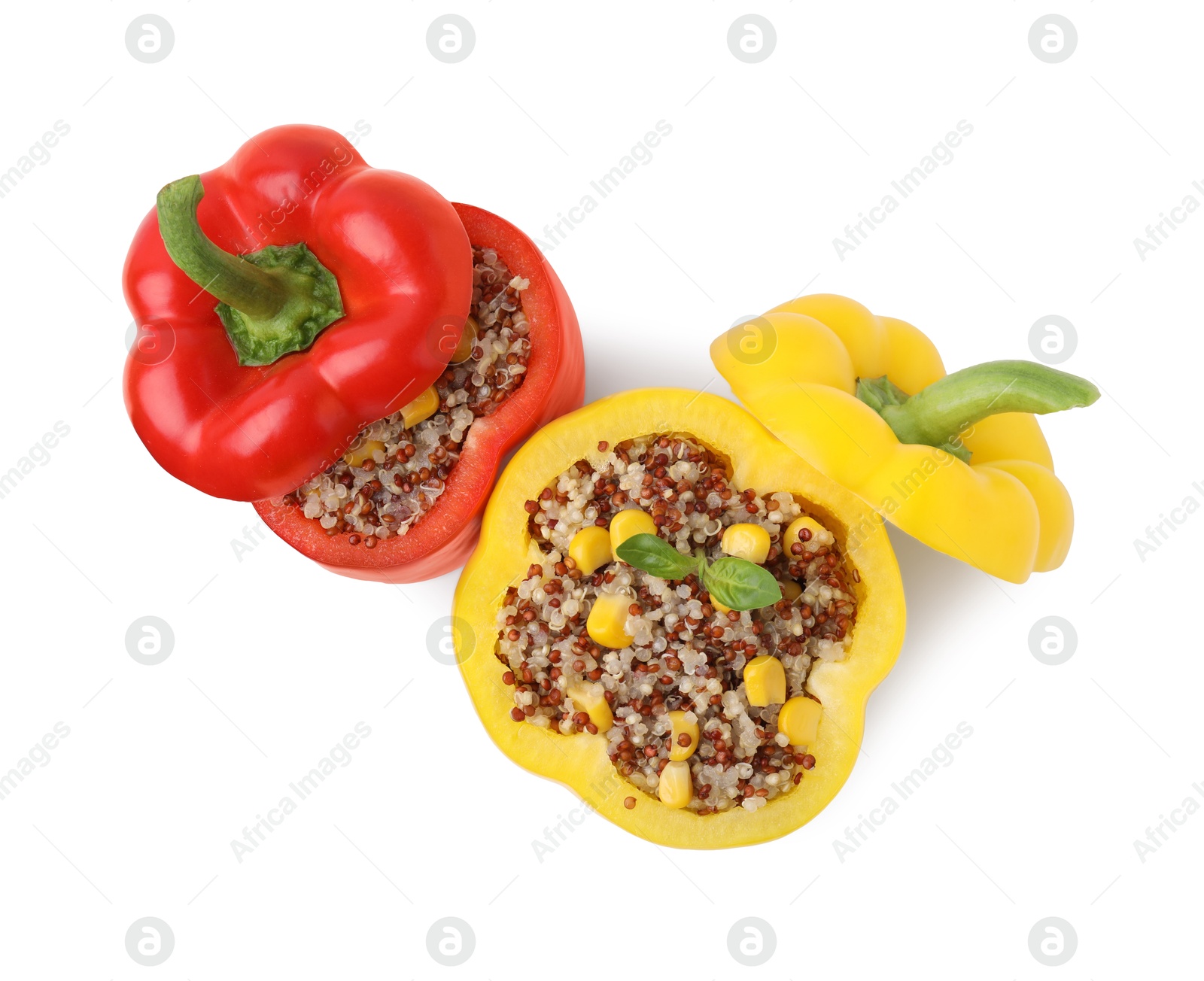 Photo of Quinoa stuffed bell peppers isolated on white, top view