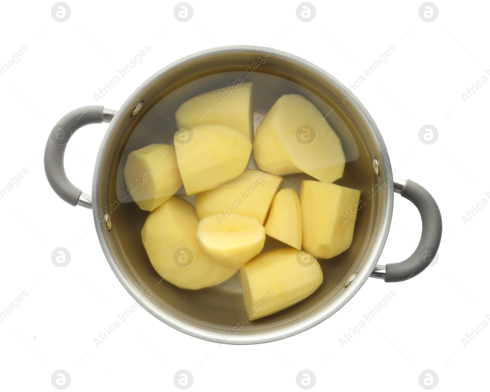 Photo of Raw potatoes in pot with water isolated on white, top view