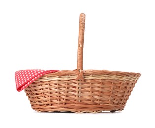 Photo of One picnic wicker basket with checkered napkin isolated on white