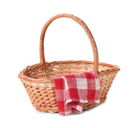 Photo of One picnic wicker basket with checkered napkin isolated on white