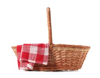 Photo of One picnic wicker basket with checkered napkin isolated on white