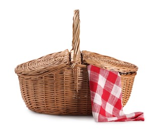 Photo of One picnic wicker basket with checkered napkin isolated on white