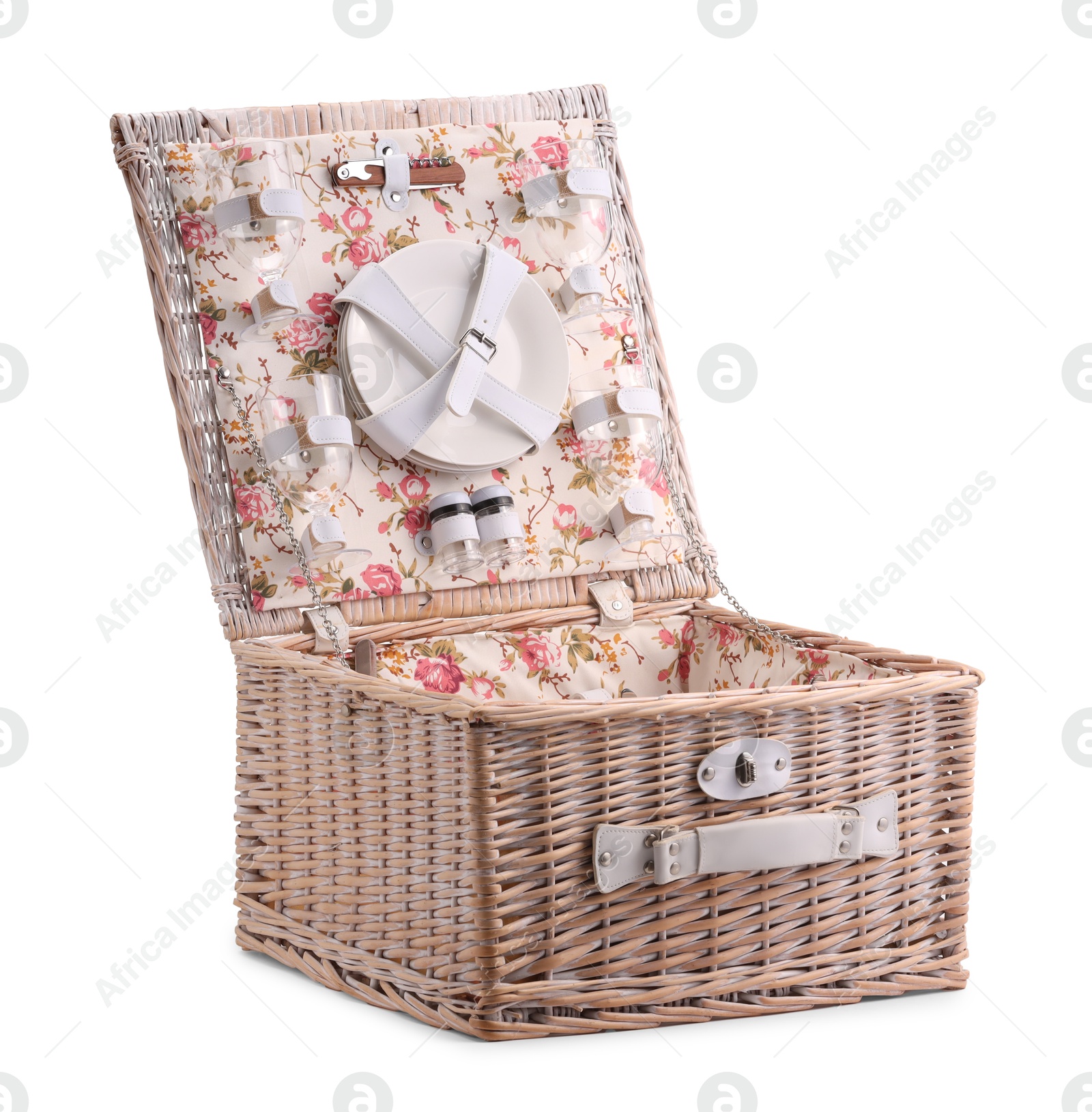 Photo of One open picnic basket with tableware isolated on white