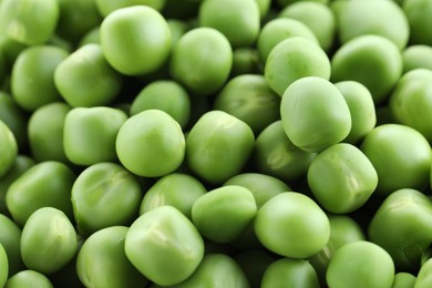 Photo of Fresh green peas as background, closeup view