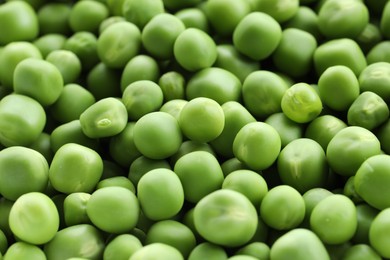 Photo of Fresh green peas as background, closeup view