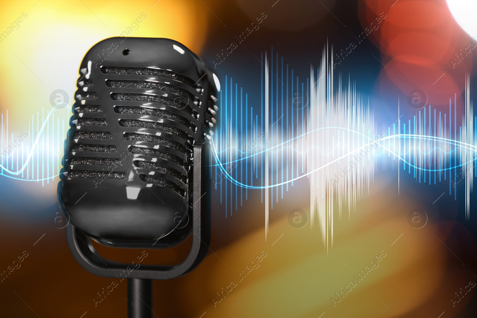 Image of Microphone and audio waveform on blurred background