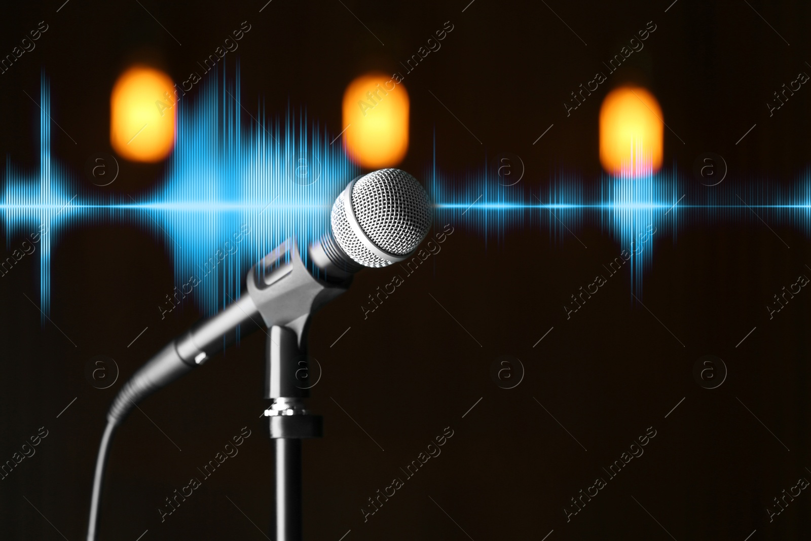 Image of Microphone and audio waveform on blurred background