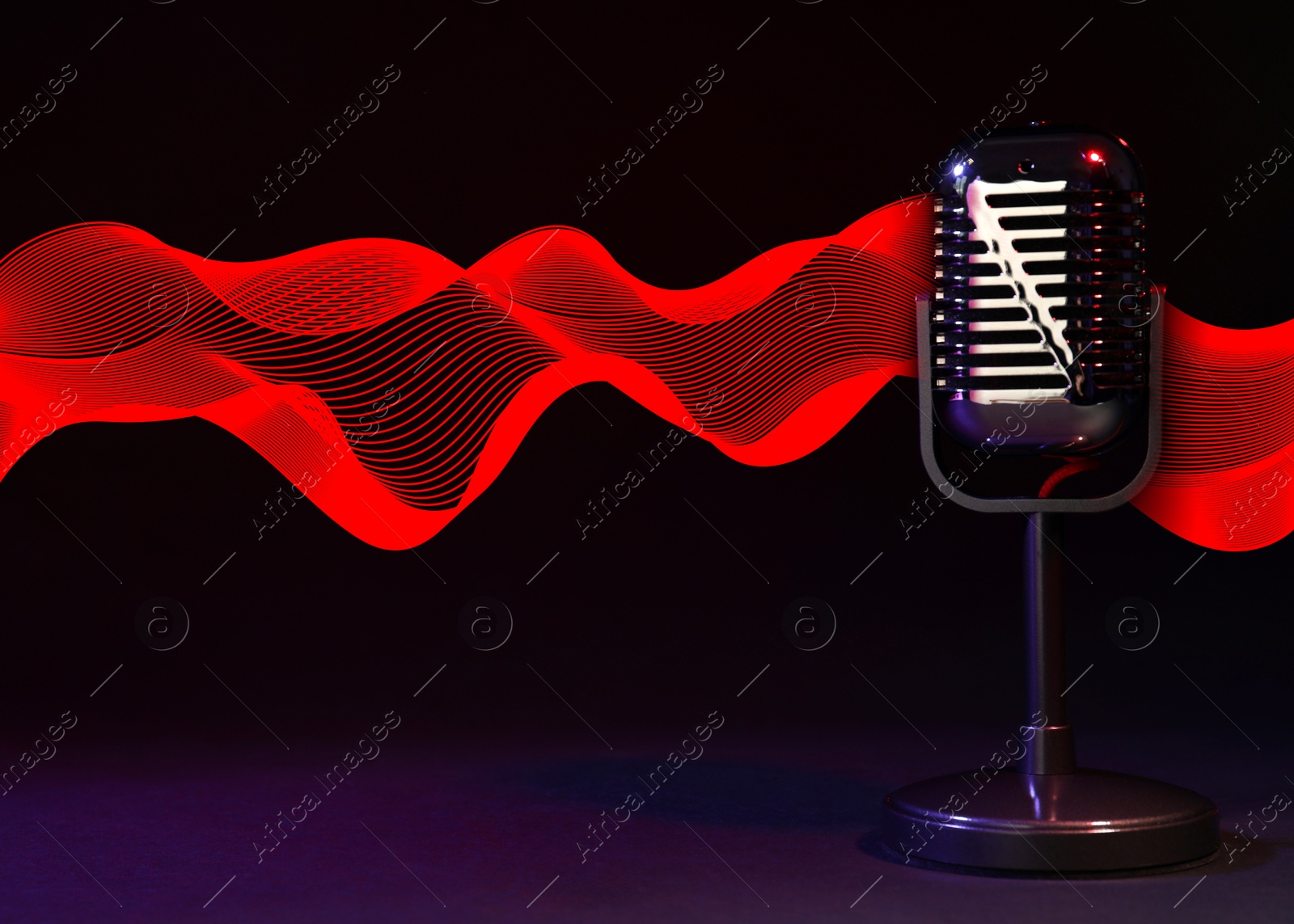 Image of Microphone and red sound waves on black background