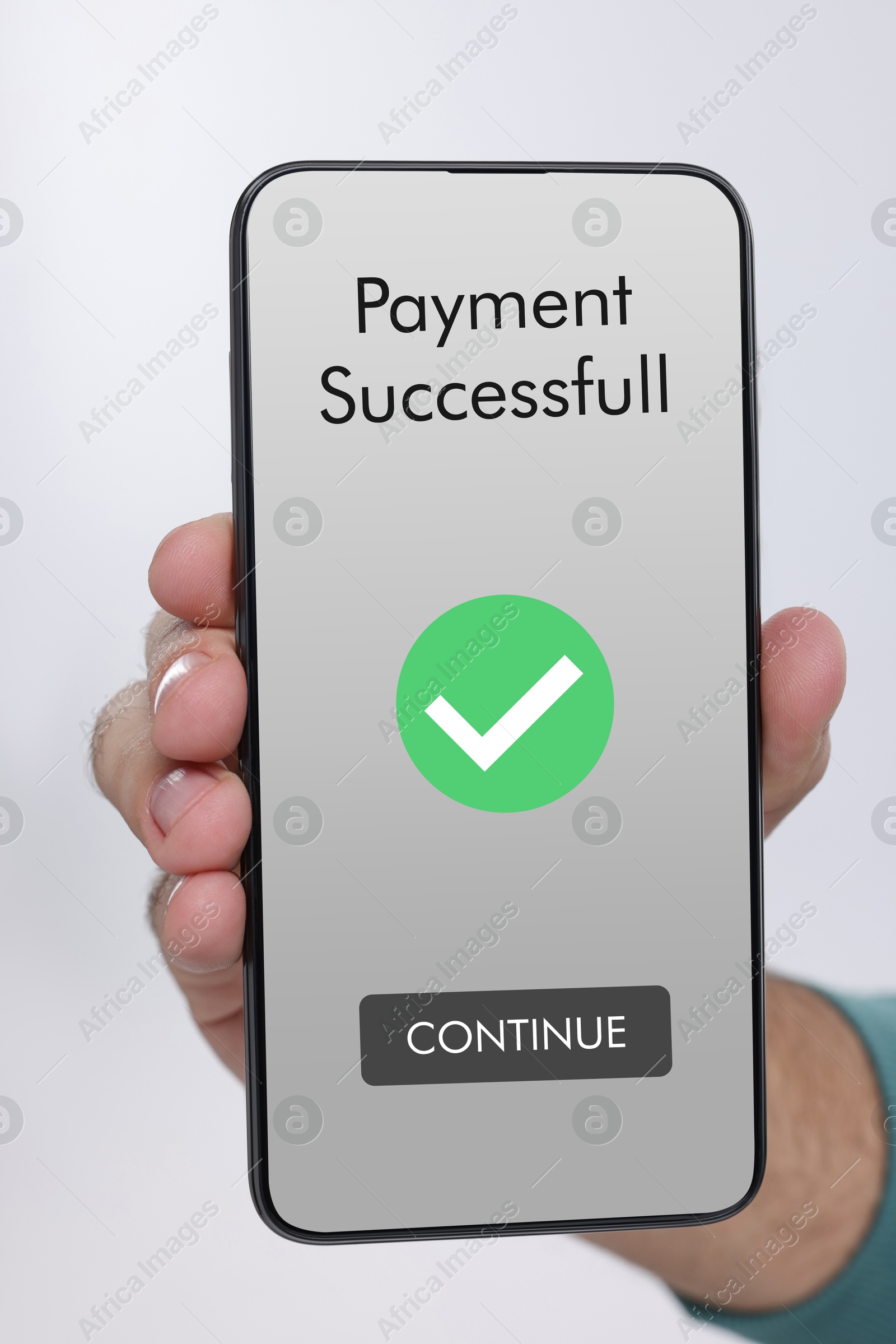 Image of Man using online payment application on mobile phone against white background, closeup