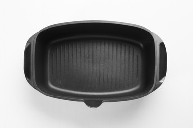 Black pot on white background, top view