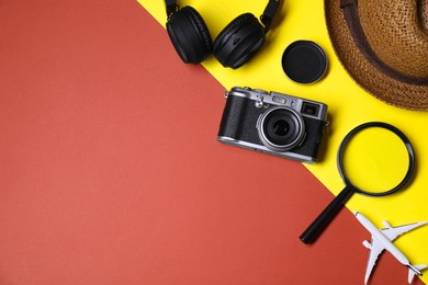 Photo of Flat lay composition with travel blogger`s items on color background